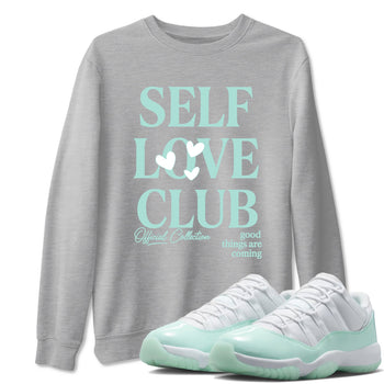 Self Love Club sneaker match t-shirt styled to complete your fit with the Air Jordan 11 Igloo sneakers, shown in Heather Grey 1.