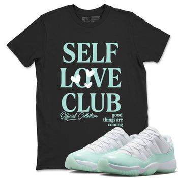 Self Love Club sneaker match t-shirt styled to complete your fit with the Air Jordan 11 Igloo sneakers, shown in Black 1.
