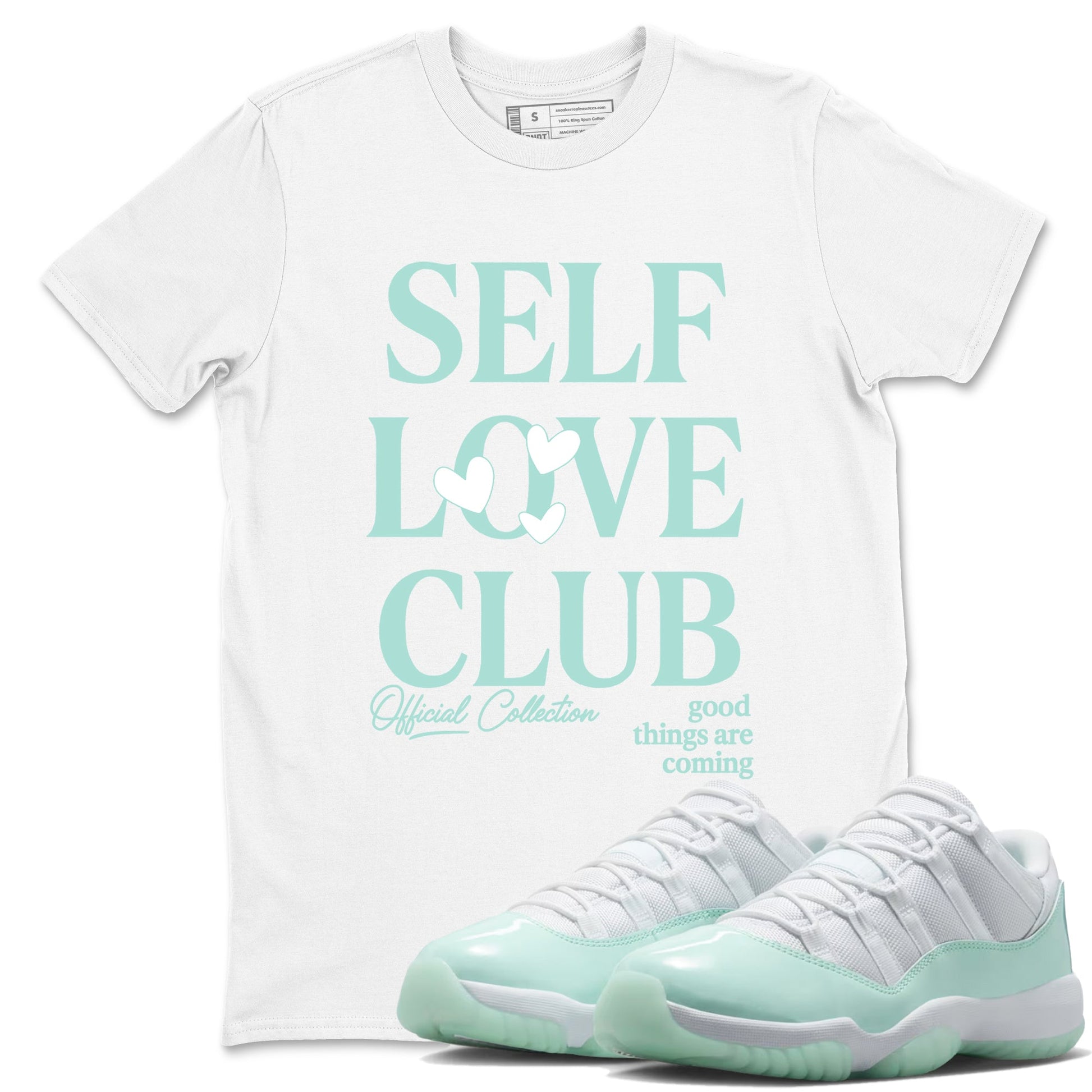 Self Love Club sneaker match t-shirt styled to complete your fit with the Air Jordan 11 Igloo sneakers, shown in White 1.