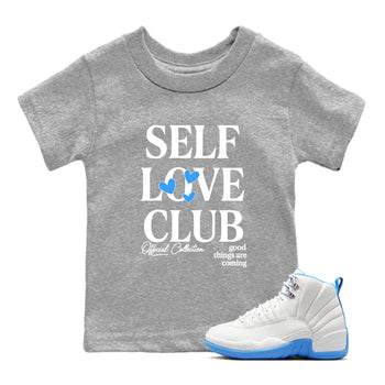Self Love Club baby and kids t-shirt crafted for little sneakerheads to shine with the Air Jordan 12 White and University Blue sneakers, displayed in Heather Grey 1.