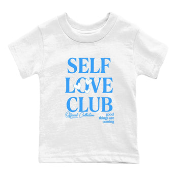 Self Love Club baby and kids t-shirt crafted for little sneakerheads to shine with the Air Jordan 12 White and University Blue sneakers, displayed in White 2.