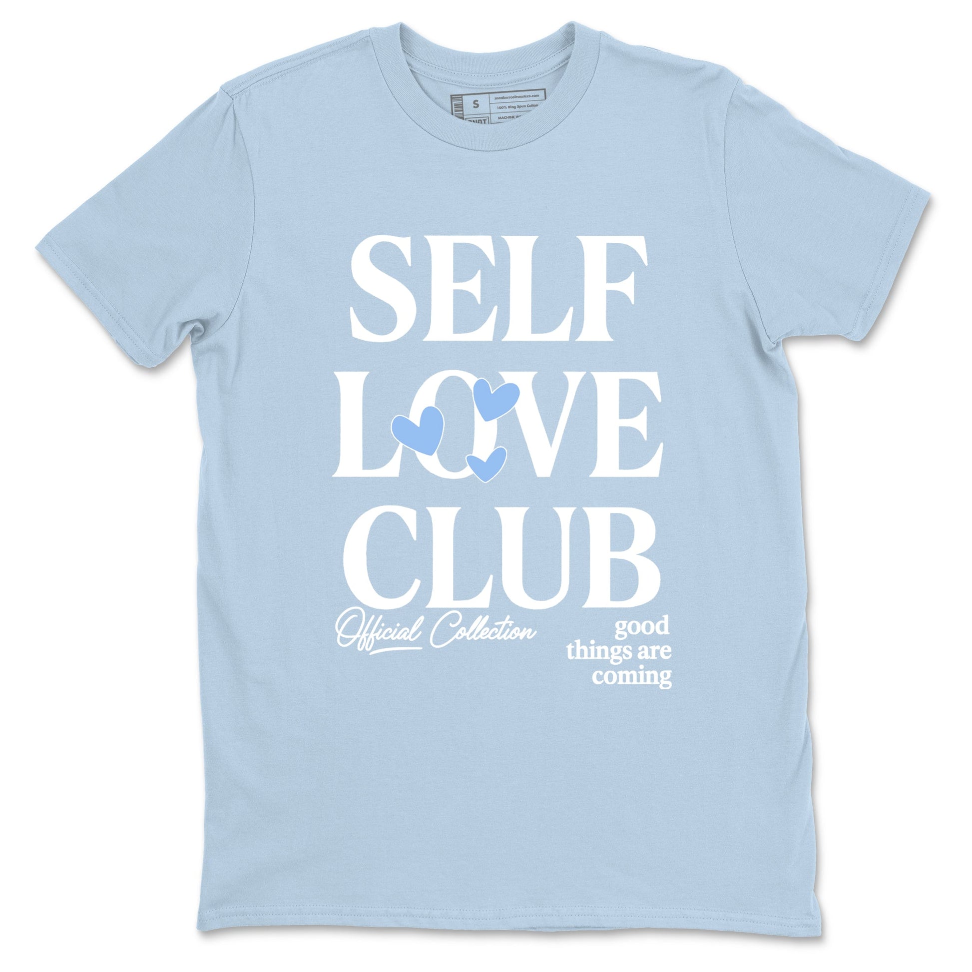 Self Love Club sneaker match t-shirt styled to complete your fit with the Air Jordan 4 Aluminum sneakers, shown in Light Blue 2.