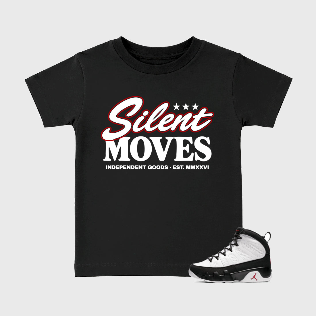 Silent Moves Baby & Kids Graphic T-Shirt featuring original artwork designed to match the Air Jordan 9 True Red. Black 1 Kids Graphic Tee.