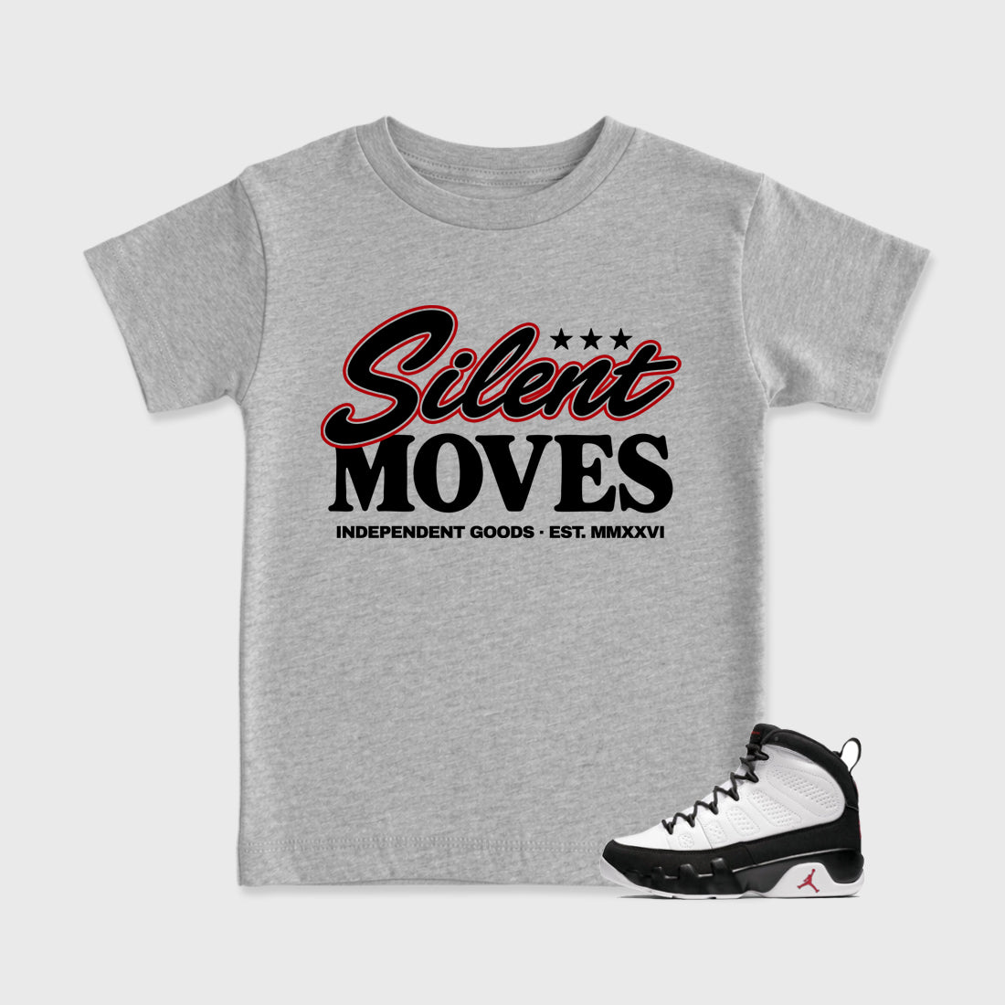 Silent Moves Baby & Kids Graphic T-Shirt featuring original artwork designed to match the Air Jordan 9 True Red. Heather Grey 1 Kids Graphic Tee.