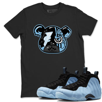 Sneaker Bear Face sneaker match t-shirt styled to complete your fit with the Air Foamposite One Psychic Blue sneakers, shown in Black 1.