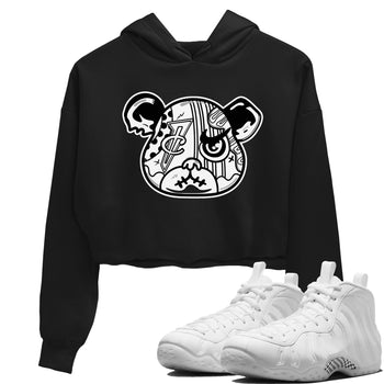 Sneaker Bear Face womens crop tee made to vibe with the Air Foamposite One Triple White sneakers — the perfect match in Black 1.