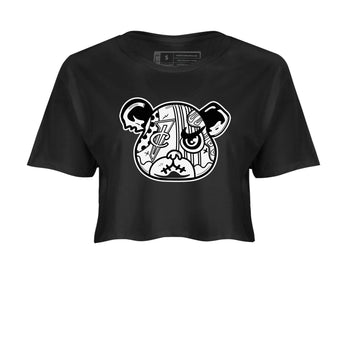 Sneaker Bear Face womens crop tee made to vibe with the Air Foamposite One Triple White sneakers — the perfect match in Black 2.