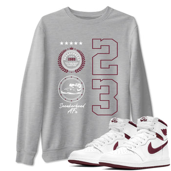Air Jordan 1 High OG Metallic Burgundy shirts to match jordans Sneaker Emblem sneaker match tees Air Jordan 1 Metallic Burgundy SNRT Sneaker Tees streetwear brand Heather Grey 1 unisex cotton tee