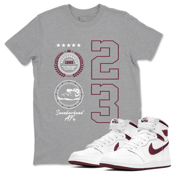 Air Jordan 1 High OG Metallic Burgundy shirts to match jordans Sneaker Emblem sneaker match tees Air Jordan 1 Metallic Burgundy SNRT Sneaker Tees streetwear brand Heather Grey 1 unisex cotton tee