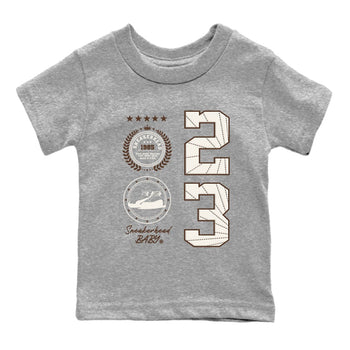 AJ12 Baroque Brown shirts to match jordans Sneaker Emblem best t shirts to wear with jordans SoleFly x Jordan 12 Baroque Brown match shoes to clothes SNRT Sneaker Tees Youth Baby Heather Grey 2 tee