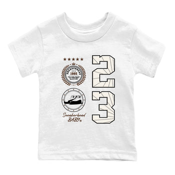 AJ12 Baroque Brown shirts to match jordans Sneaker Emblem best t shirts to wear with jordans SoleFly x Jordan 12 Baroque Brown match shoes to clothes SNRT Sneaker Tees Youth Baby White 2 tee