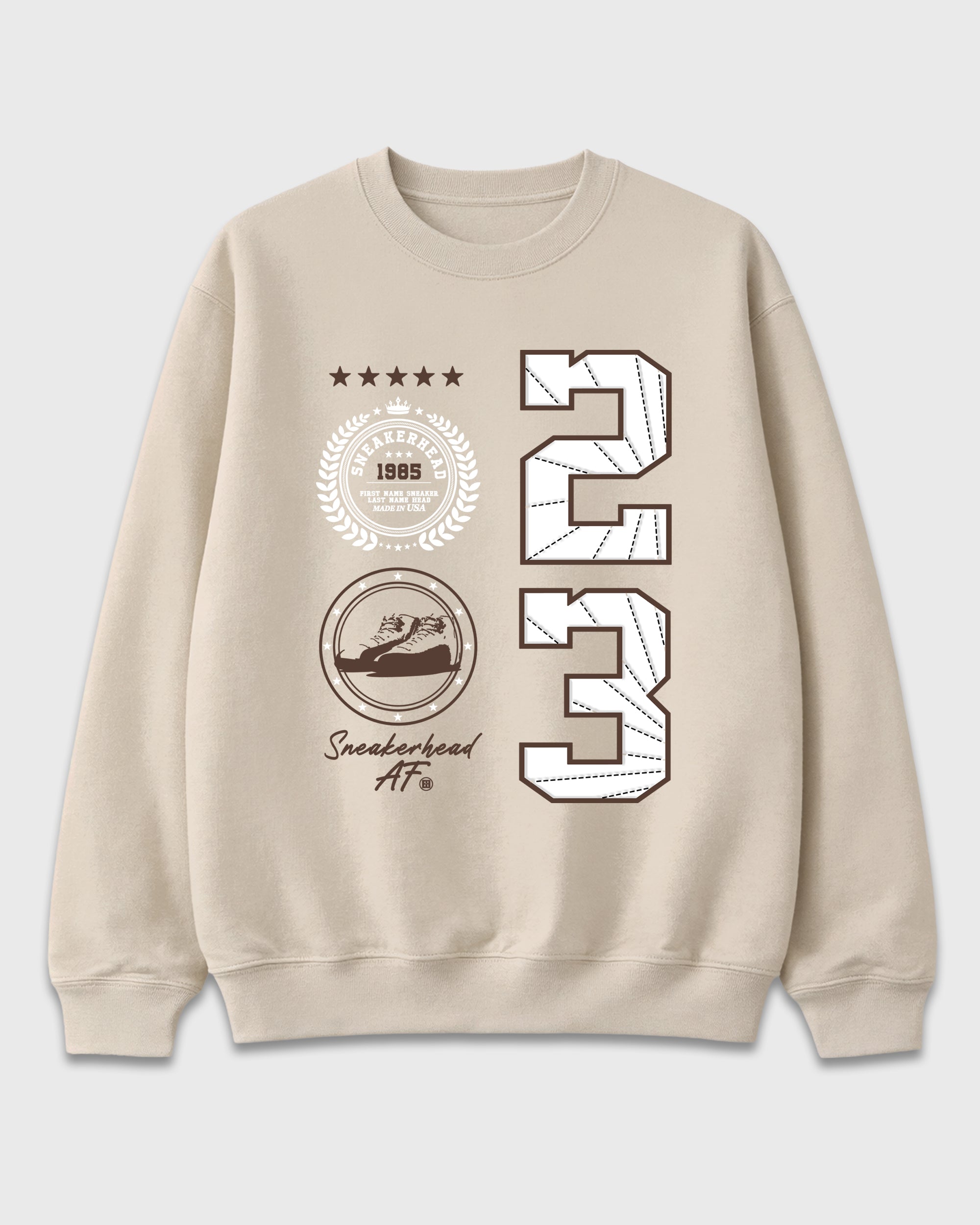 Sneaker Emblem Graphic T-Shirt featuring original streetwear artwork designed to match the Air Jordan 12 Fireside. Natural 2 Graphic Tee.