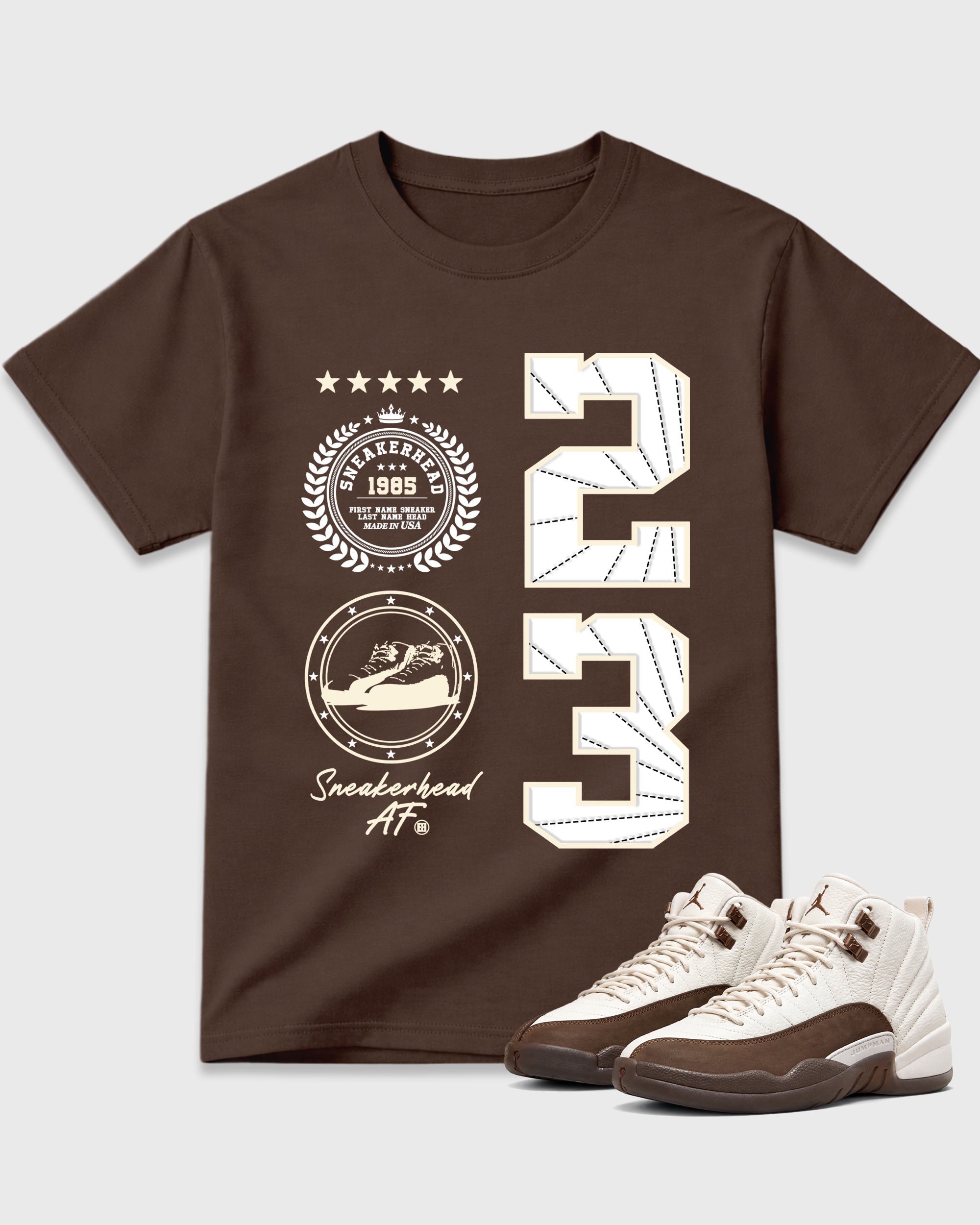 Sneaker Emblem Graphic T-Shirt featuring original streetwear artwork designed to match the Air Jordan 12 Fireside. Dark Chocolate 1 Graphic T-Shirt.