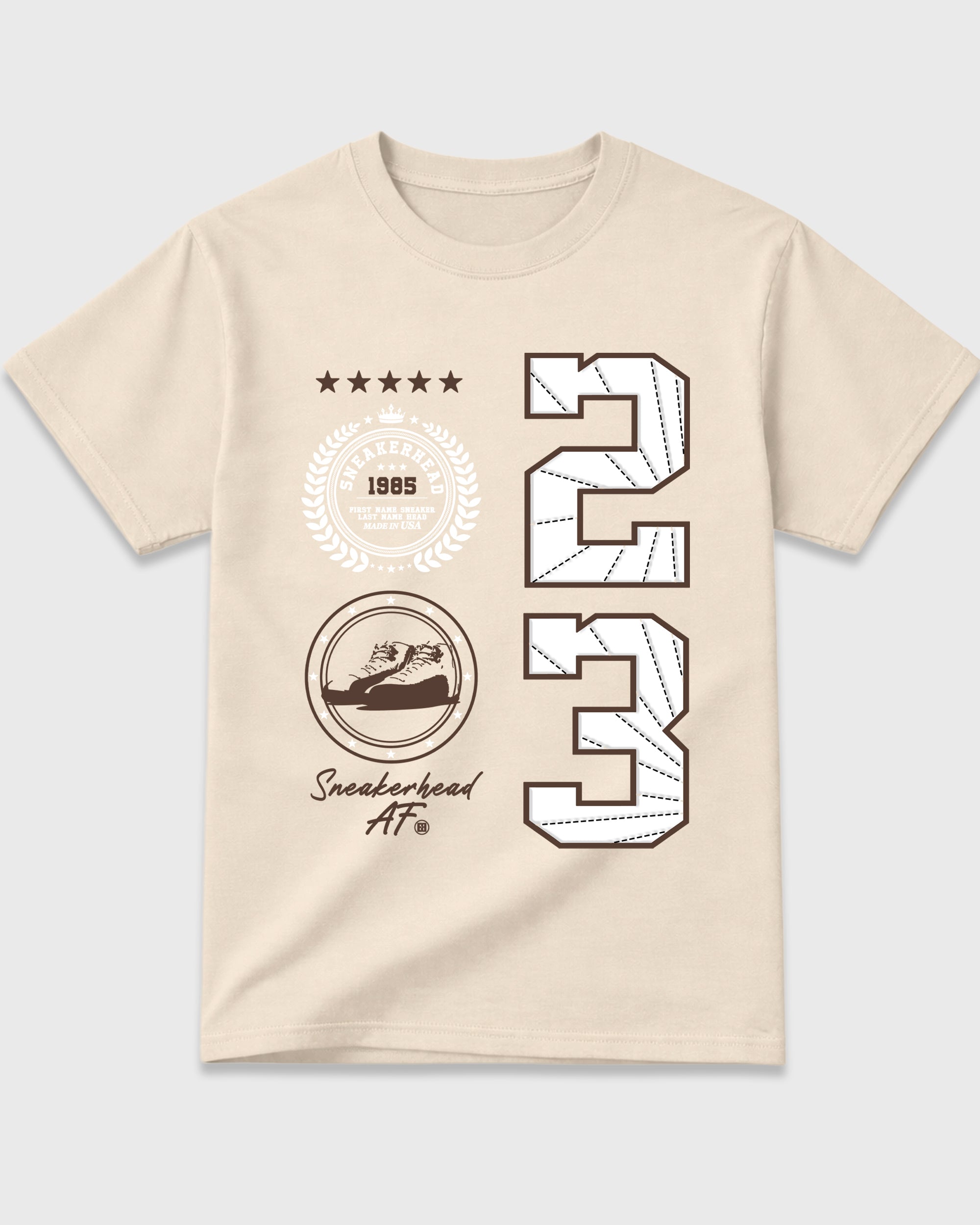 Sneaker Emblem Graphic T-Shirt featuring original streetwear artwork designed to match the Air Jordan 12 Fireside. Natural 2 Graphic T-Shirt.