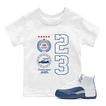 Sneaker Emblem baby and kids t-shirt crafted for little sneakerheads to shine with the Air Jordan 12 French Blue sneakers, displayed in White 1.
