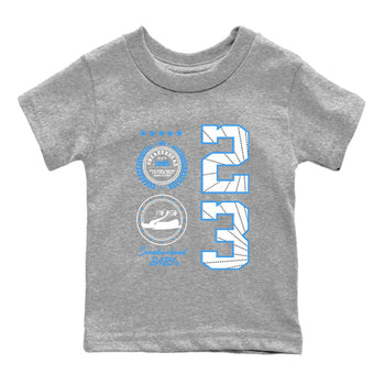 Sneaker Emblem baby and kids t-shirt crafted for little sneakerheads to shine with the Air Jordan 12 White and University Blue sneakers, displayed in Heather Grey 2.