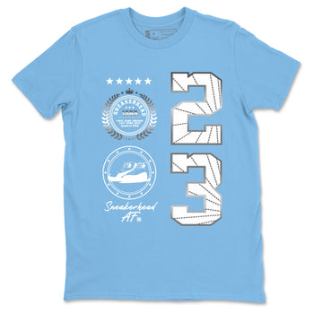Sneaker Emblem sneaker match t-shirt styled to complete your fit with the Air Jordan 12 White and University Blue sneakers, shown in Carolina Blue 2.