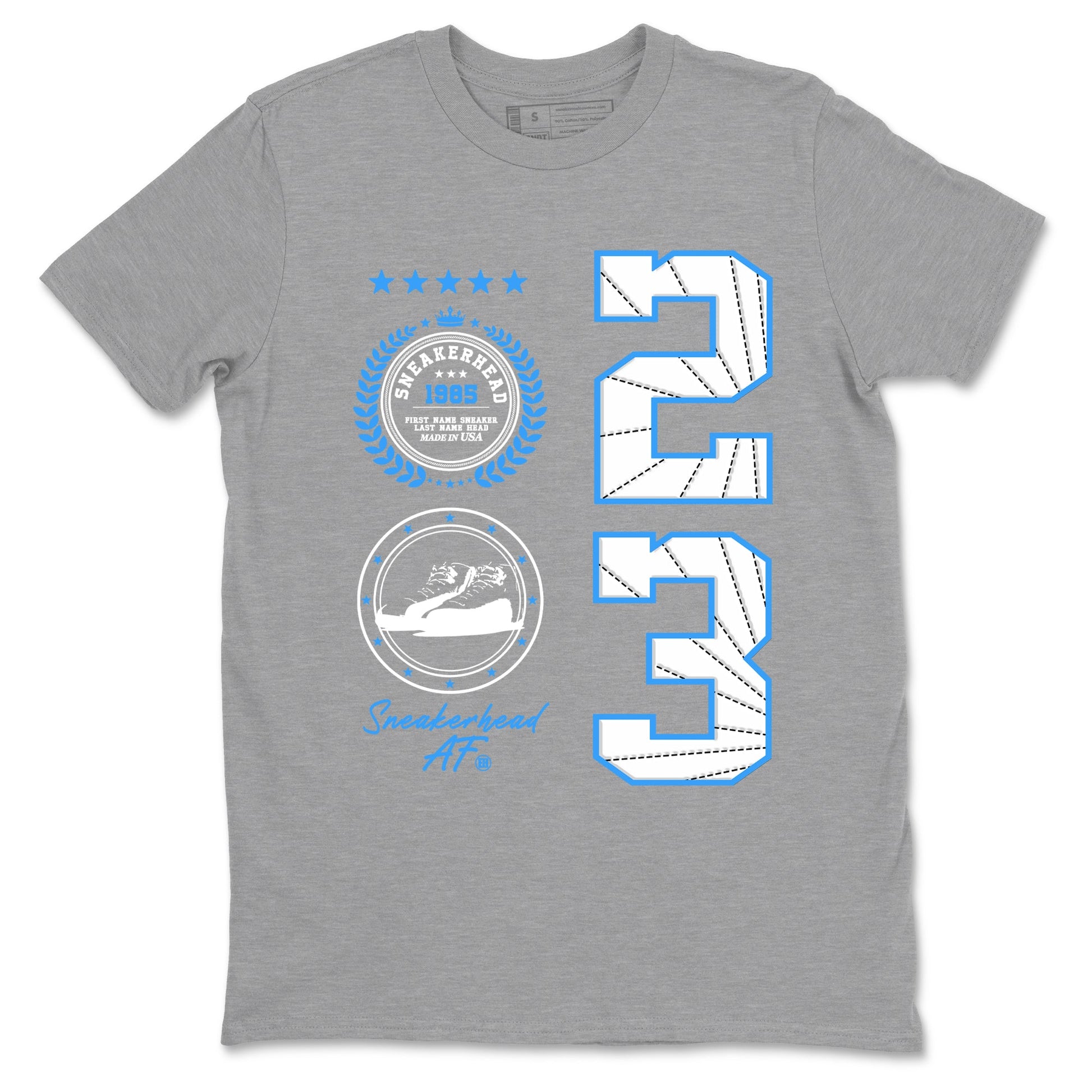 Sneaker Emblem sneaker match t-shirt styled to complete your fit with the Air Jordan 12 White and University Blue sneakers, shown in Heather Grey 2.