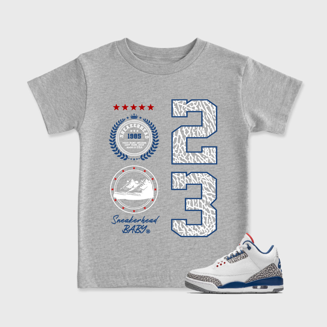 Sneaker Emblem Baby & Kids Graphic T-Shirt featuring original artwork designed to match the Air Jordan 3 True Blue. Heather Grey 1 Kids Graphic Tee.