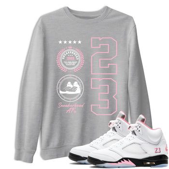Sneaker Emblem sneaker match t-shirt styled to complete your fit with the Air Jordan 5 35th Anniversary sneakers, shown in Heather Grey 1.