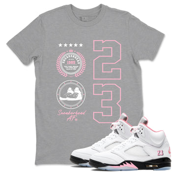 Sneaker Emblem sneaker match t-shirt styled to complete your fit with the Air Jordan 5 35th Anniversary sneakers, shown in Heather Grey 1.