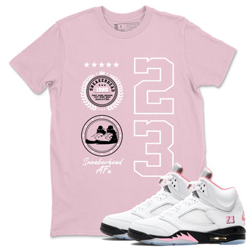 Sneaker Emblem sneaker match t-shirt styled to complete your fit with the Air Jordan 5 35th Anniversary sneakers, shown in Pink 1.
