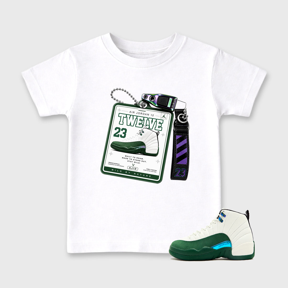 Sneaker Hang Tag Baby & Kids Graphic T-Shirt featuring original artwork designed to match the Air Jordan 12 Summit Green. White 1 Kids Graphic Tee.