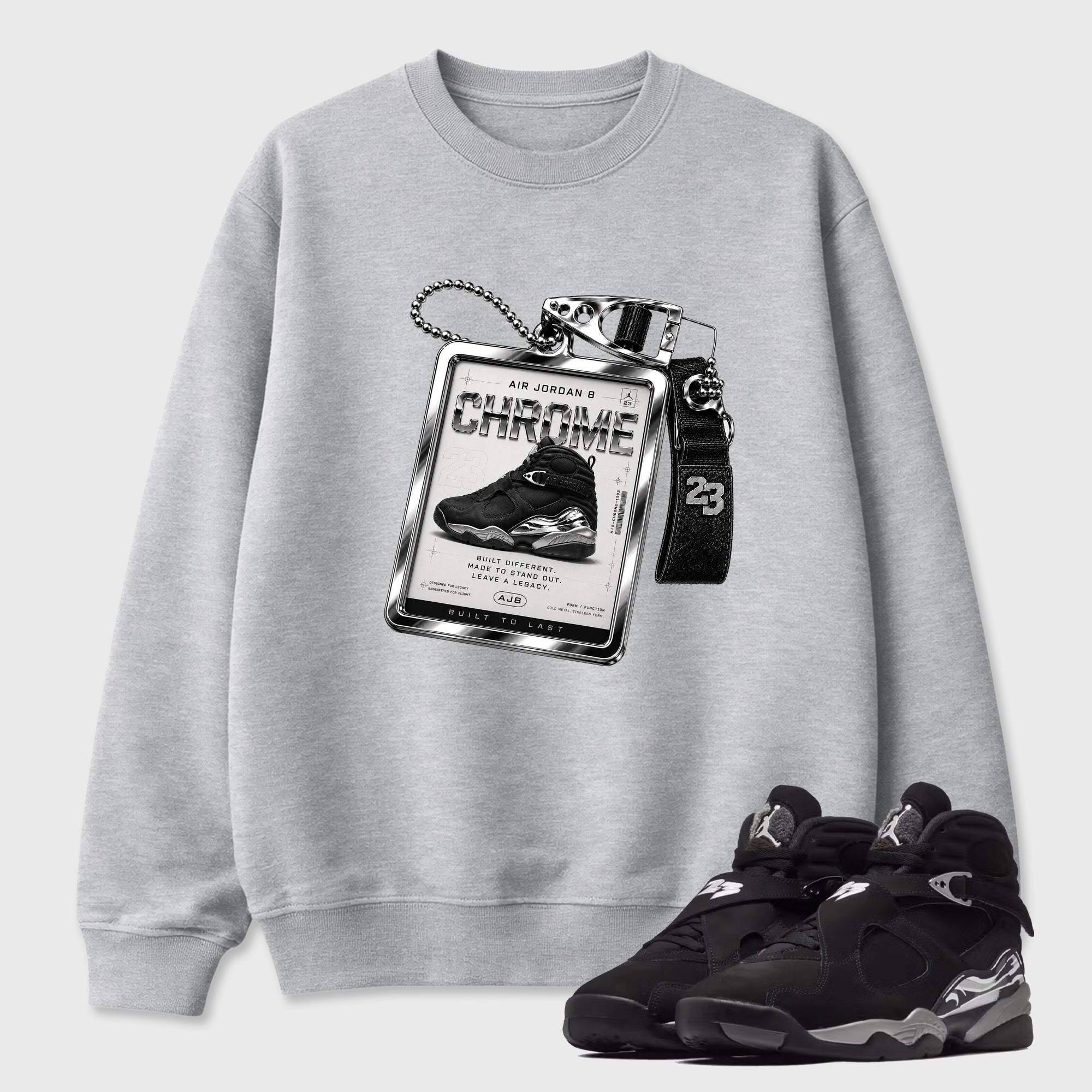 Sneaker Hang Tag Graphic T-Shirt featuring original streetwear artwork designed to match the Air Jordan 8 Chrome. Heather Grey 1 Graphic Tee.