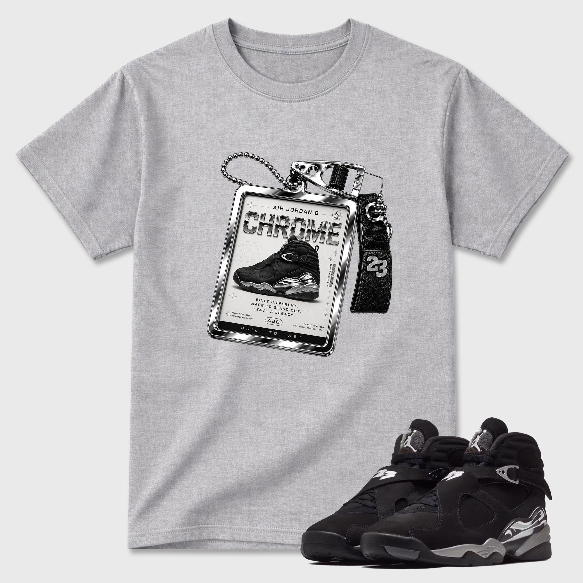 Sneaker Hang Tag Graphic T-Shirt featuring original streetwear artwork designed to match the Air Jordan 8 Chrome. Heather Grey 1 Graphic T-Shirt.