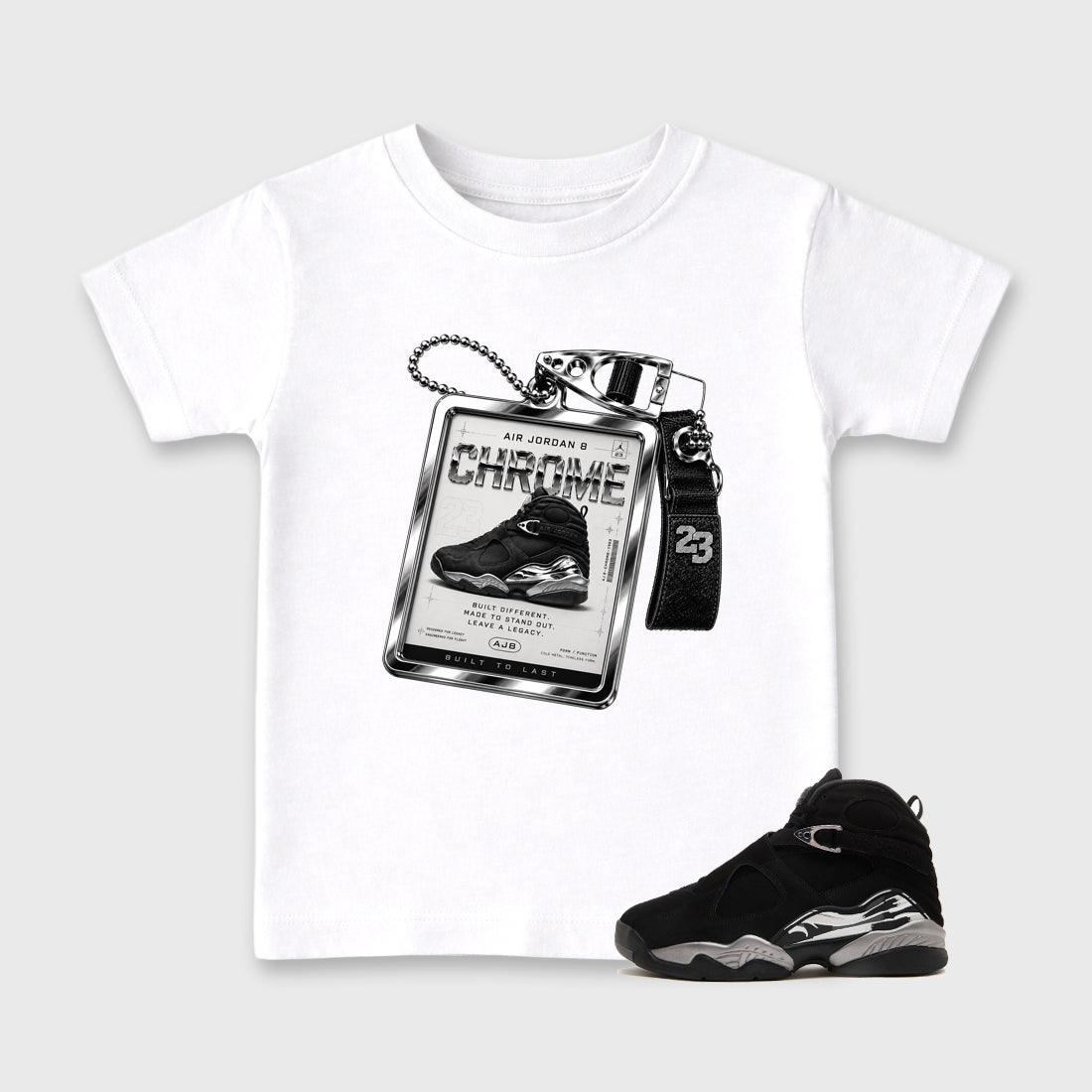 Sneaker Hang Tag Baby & Kids Graphic T-Shirt featuring original artwork designed to match the Air Jordan 8 Chrome. White 1 Kids Graphic Tee.