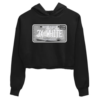 Sneaker Plate womens crop tee made to vibe with the Air Foamposite One Triple White sneakers — the perfect match in Black 2.