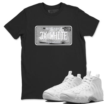 Sneaker Plate sneaker match t-shirt styled to complete your fit with the Air Foamposite One Triple White sneakers, shown in Black 1.