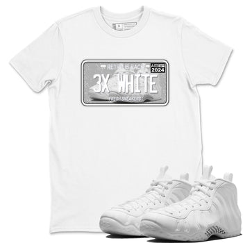 Sneaker Plate sneaker match t-shirt styled to complete your fit with the Air Foamposite One Triple White sneakers, shown in White 1.