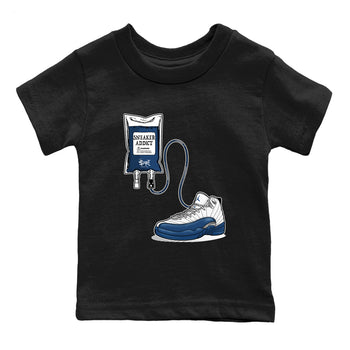 Sneaker Therapy baby and kids t-shirt crafted for little sneakerheads to shine with the Air Jordan 12 French Blue sneakers, displayed in Black 2.