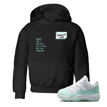 Sneakerhead Badge baby and kids t-shirt crafted for little sneakerheads to shine with the Air Jordan 11 Igloo sneakers, displayed in Black 1.