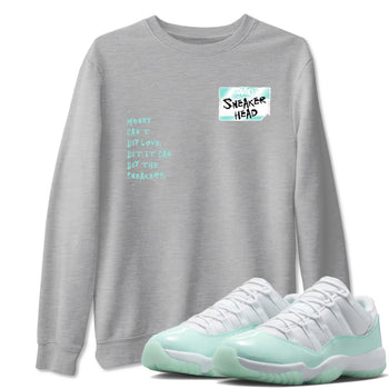 Sneakerhead Badge sneaker match t-shirt styled to complete your fit with the Air Jordan 11 Igloo sneakers, shown in Heather Grey 1.