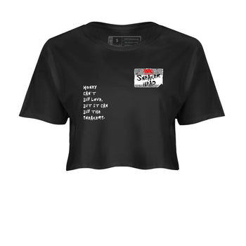 Sneakerhead Badge womens crop tee made to vibe with the Air Jordan 4 White Cement sneakers — the perfect match in Black 2.