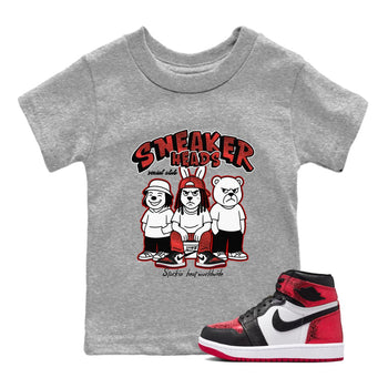 Sneakerheads Social Club baby and kids t-shirt crafted for little sneakerheads to shine with the Air Jordan 1 Ruby sneakers, displayed in Heather Grey 1.