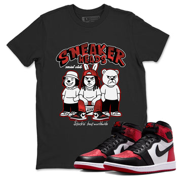 Sneakerheads Social Club sneaker match t-shirt styled to complete your fit with the Air Jordan 1 Ruby sneakers, shown in Black 1.