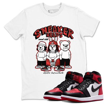 Sneakerheads Social Club sneaker match t-shirt styled to complete your fit with the Air Jordan 1 Ruby sneakers, shown in White 1.