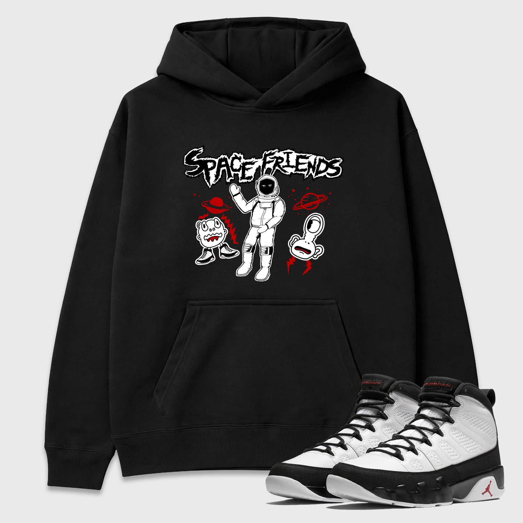 Space Friends Graphic T-Shirt featuring original streetwear artwork designed to match the Air Jordan 9 True Red. Black 1 Graphic Tee.