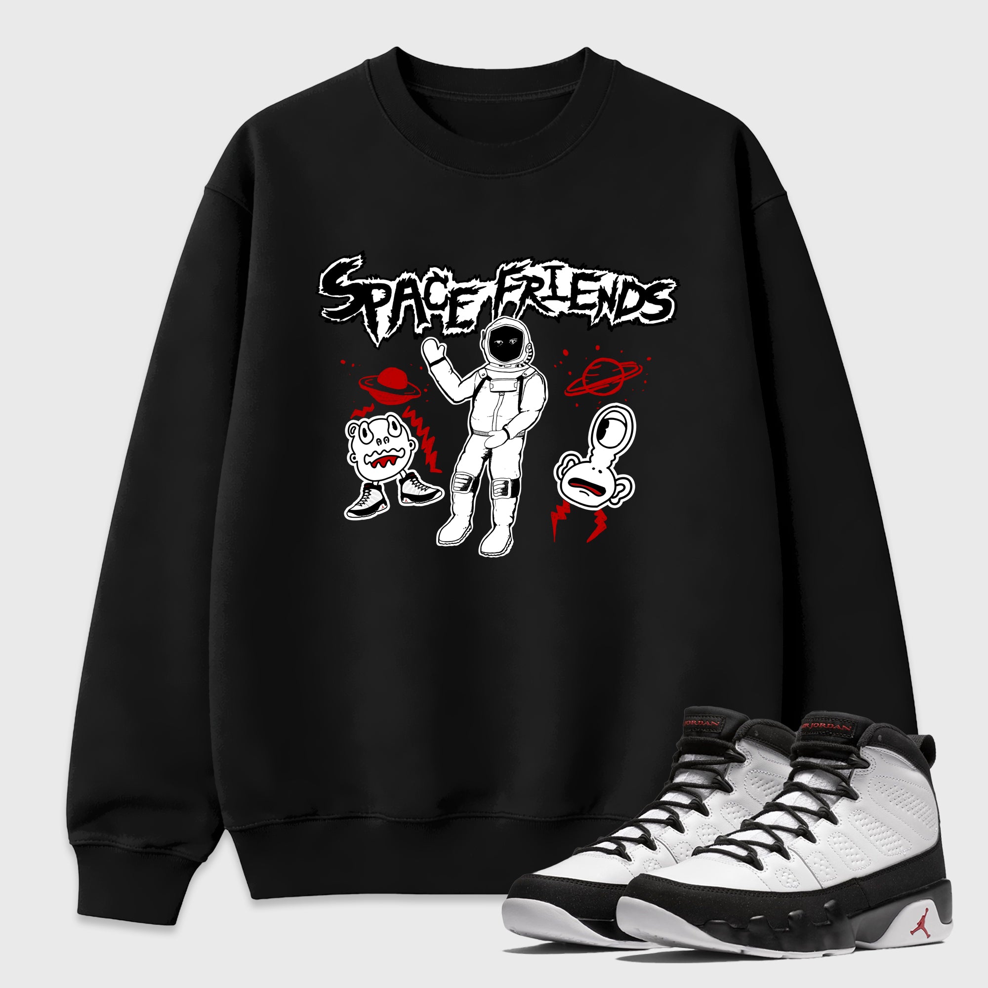 Space Friends Graphic T-Shirt featuring original streetwear artwork designed to match the Air Jordan 9 True Red. Black 1 Graphic Tee.