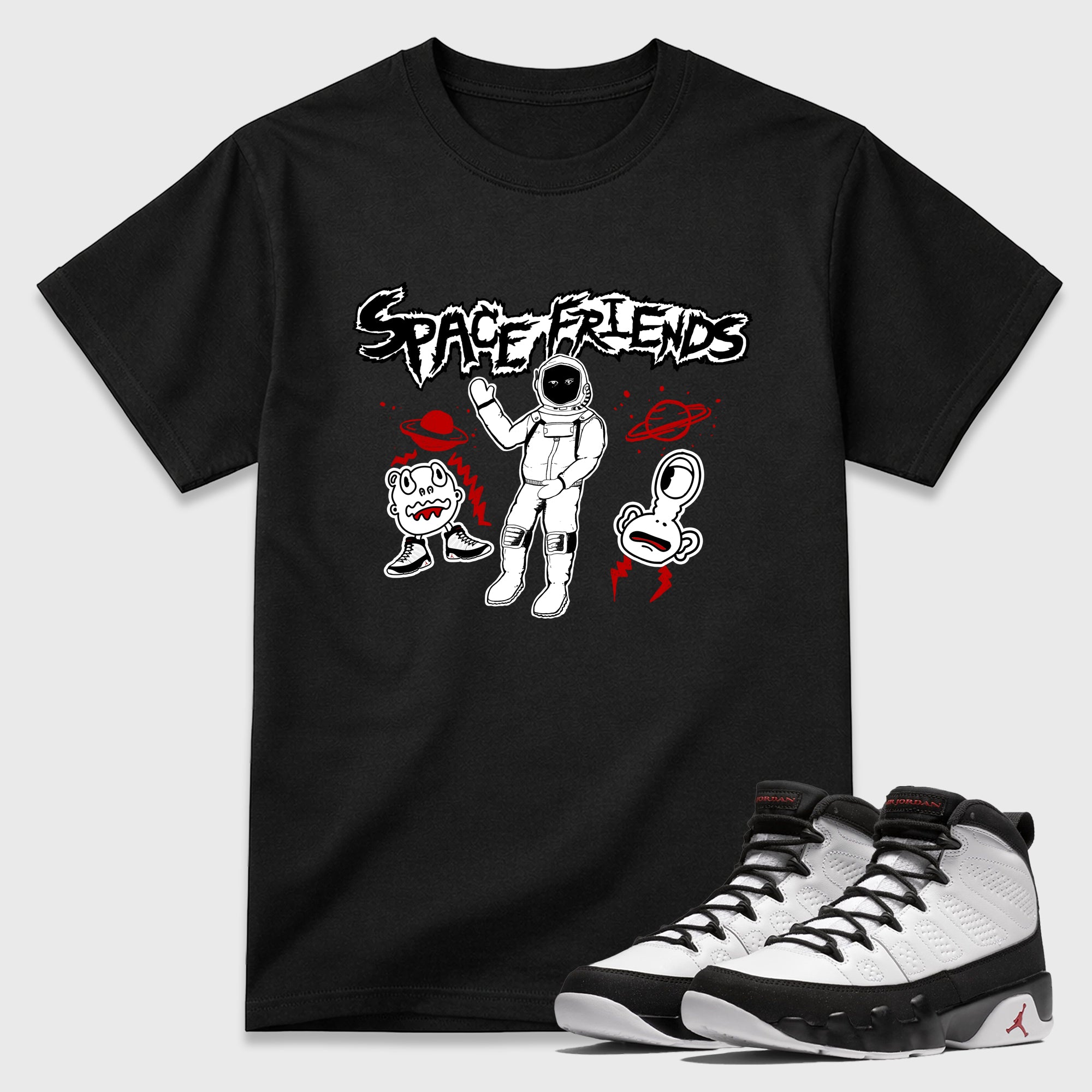 Space Friends Graphic T-Shirt featuring original streetwear artwork designed to match the Air Jordan 9 True Red. Black 1 Graphic T-Shirt.
