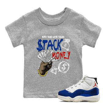 Gray t-shirt with 'Stack Money' graphic and a white and blue sneaker.