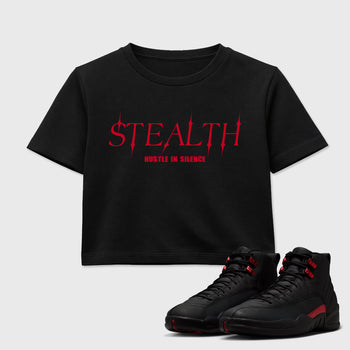 Stealth women’s crop tee designed to match the Air Jordan 12 Bloodline, featuring coordinated Black 1 options for a perfect streetwear vibe.