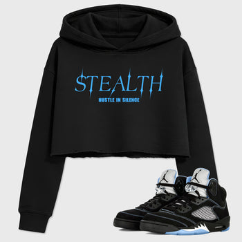Stealth women’s crop tee designed to match the Air Jordan 5 Black Carolina, featuring coordinated Black 1 options for a perfect streetwear vibe.
