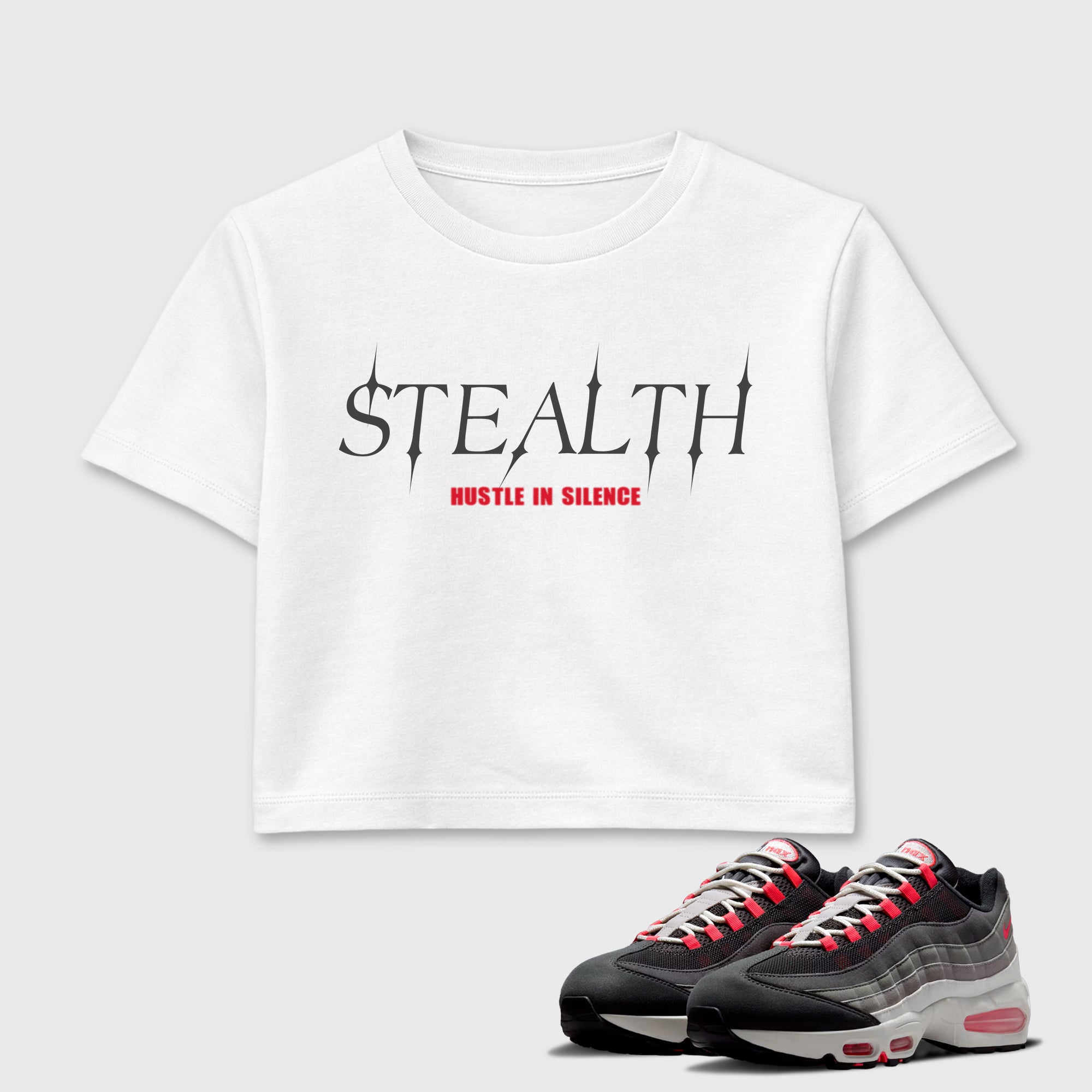 Stealth women’s crop tee designed to match the Air Max 95 Reverse Solar Red, featuring coordinated White 1 options for a perfect streetwear vibe.