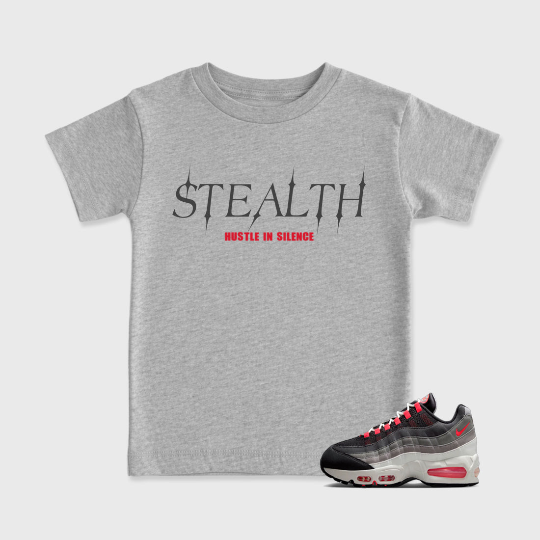 Stealth Baby & Kids Graphic T-Shirt featuring original artwork designed to match the Air Max 95 Reverse Solar Red. Heather Grey 1 Kids Graphic Tee.