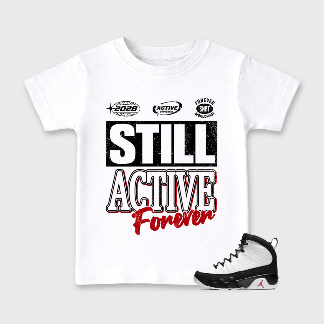 Still Active Baby & Kids Graphic T-Shirt featuring original artwork designed to match the Air Jordan 9 True Red. White 1 Kids Graphic Tee.