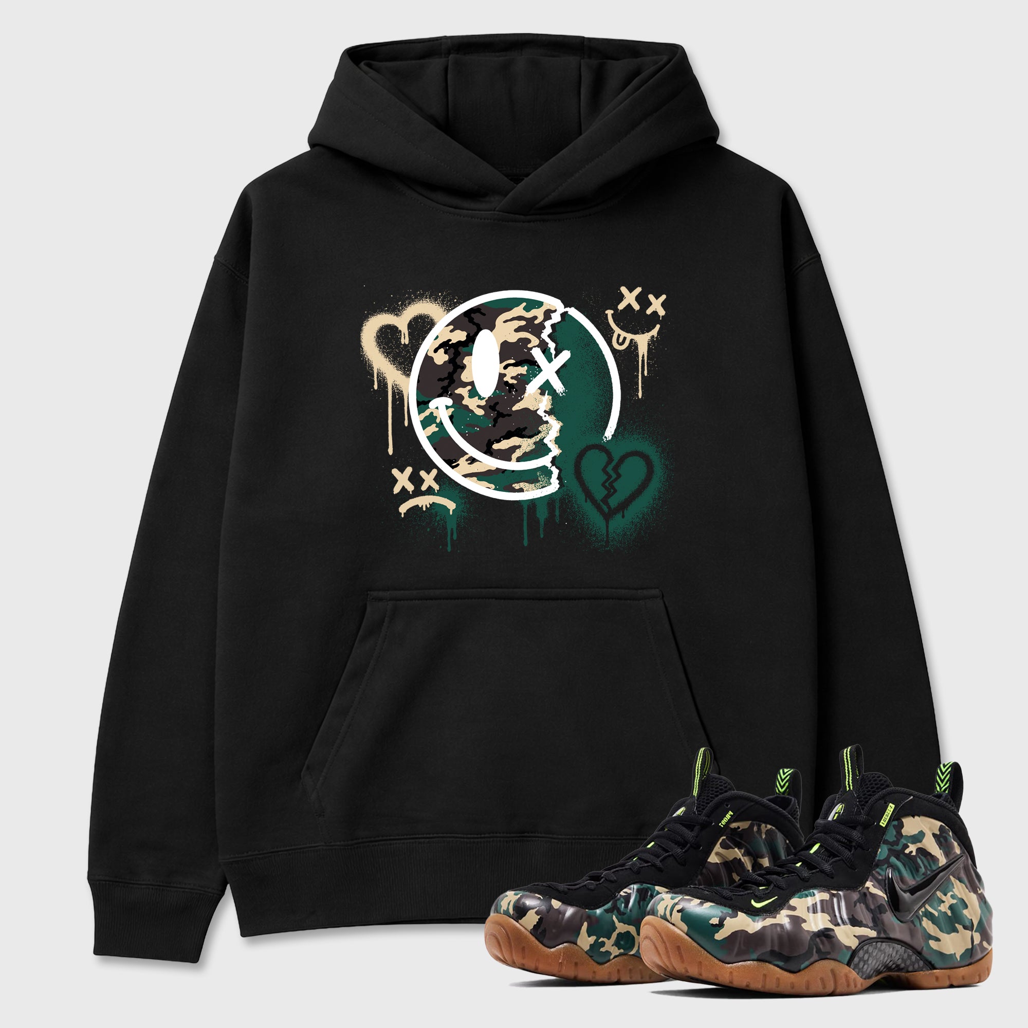 Sweet Damage Graphic T-Shirt featuring original streetwear artwork designed to match the Air Foamposite Pro Green Camo. Black 1 Graphic Tee.